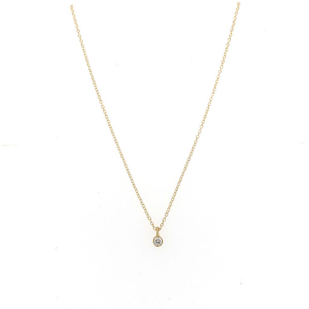 Just a Diamond Gold Pendant with a 7 point diamond.