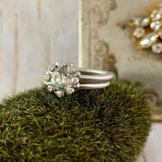 diamond ring on green moss